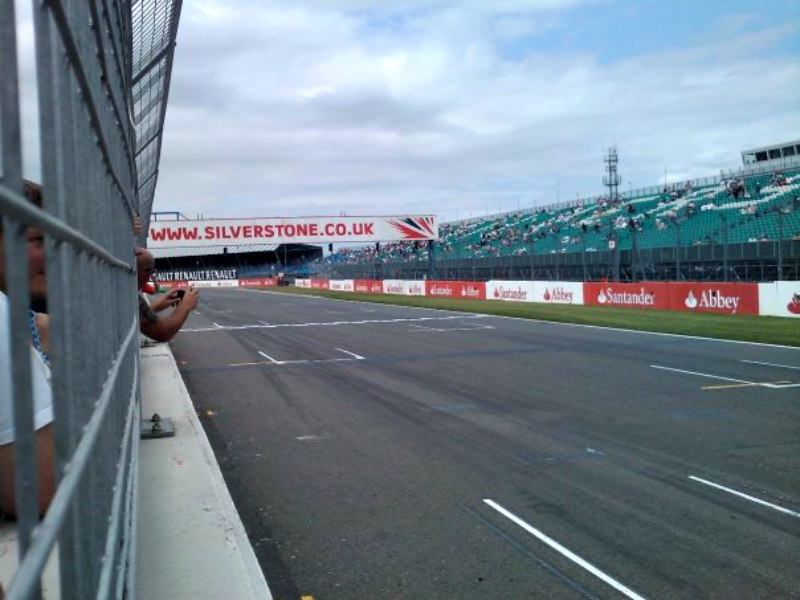 Silverstone Circuit with spectators and advertising banners