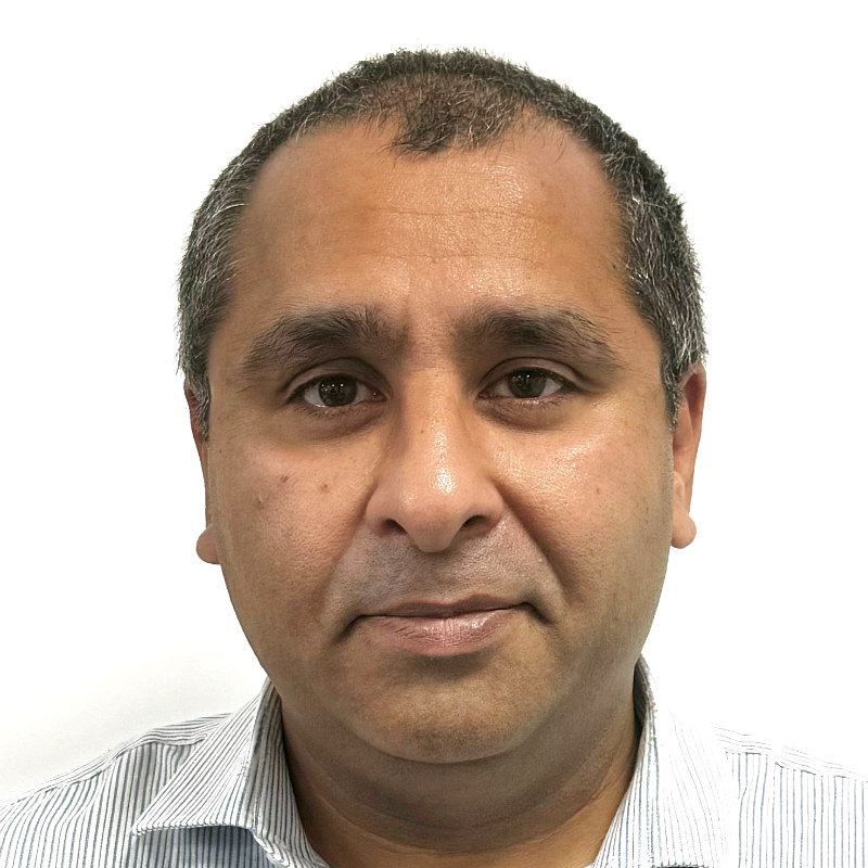 Middle-aged man with calm expression, headshot.