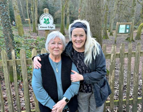 Two women smiling together at Kinver Edge park